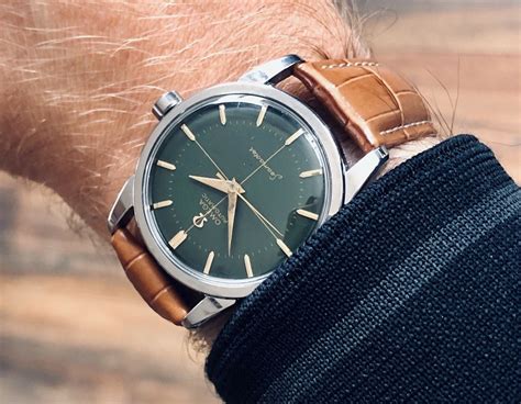 vintage Omega Seamaster green dial